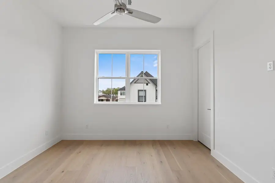 Bright and spacious with large windows, a private walk-in closet, and a MinkaAire ceiling fan. Bright and spacious with large windows, a private walk-in closet, and a MinkaAire ceiling fan.