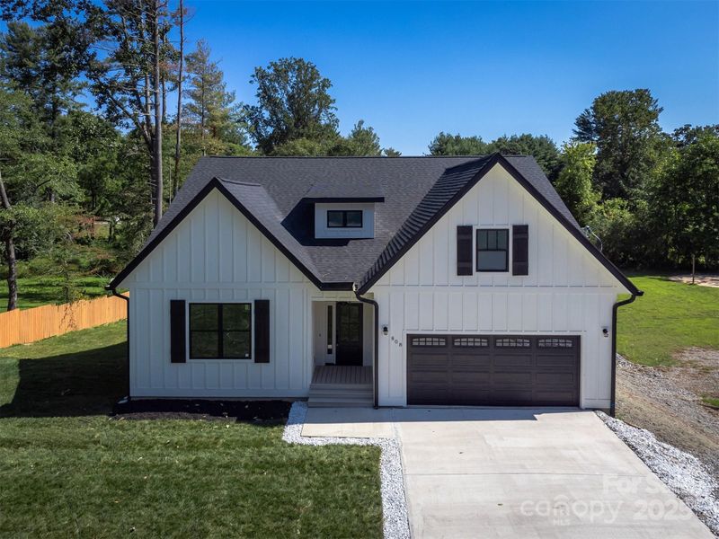 Front exterior of a new home in , Hendersonville, NC, highlighting curb appeal (Image 31).