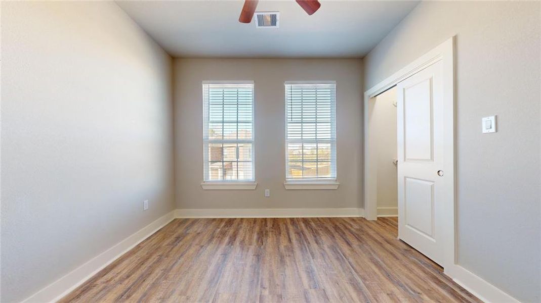 This secondary bedroom is located in the front of the house.