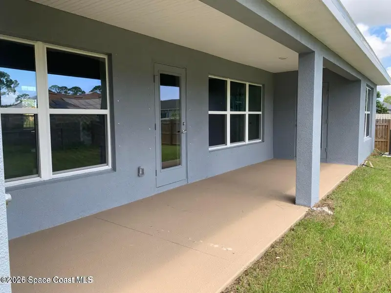 Exterior details and patio area of a home in Palm Bay, Palm Bay (Image 2). Exterior details and patio area of a home in Palm Bay, Palm Bay (Image 2).