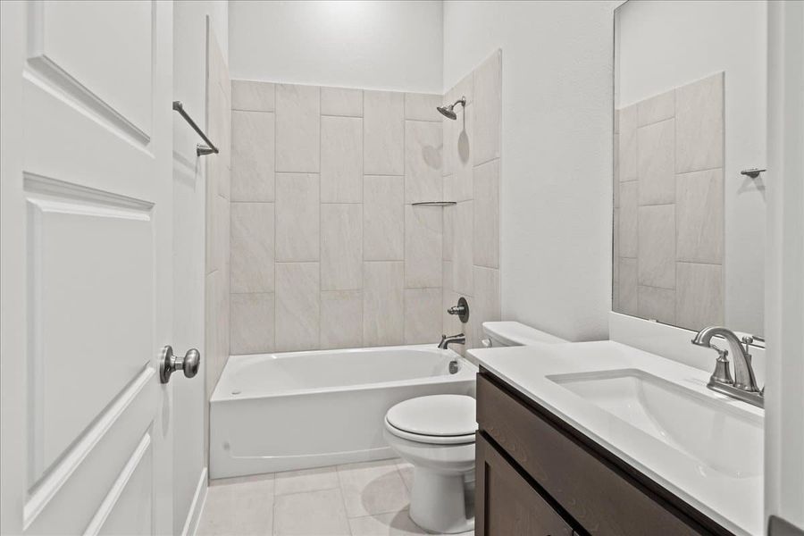 Furnished interior view inside a new home in Trace, San Marcos (Image 14).