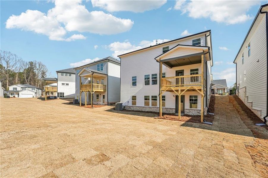 Exterior details and patio area of a home in Westmont Preserve, Powder Springs (Image 28).