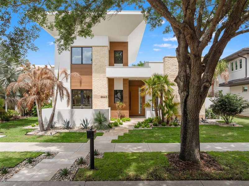 Front exterior of a new home in , Orlando, FL, highlighting curb appeal (Image 29).
