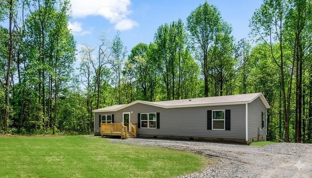 Exterior details and patio area of a home in , Ellijay (Image 26).