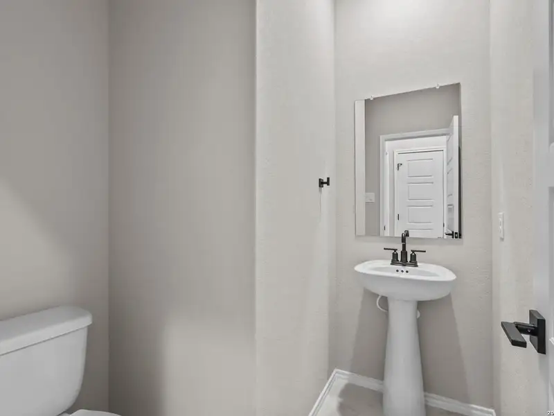 Furnished interior view inside a new home in Bricewood, San Antonio (Image 21).