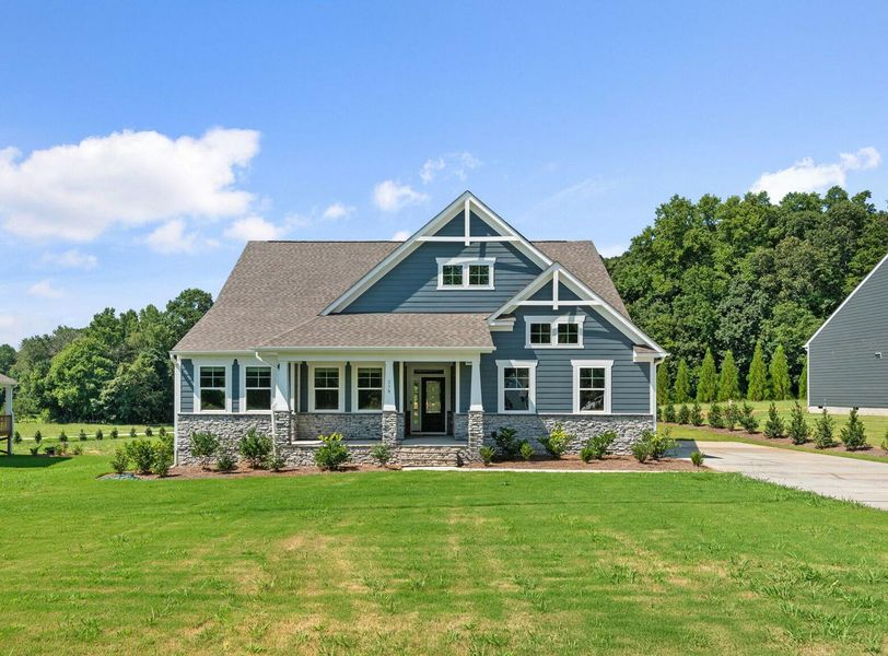 Front exterior of a new home in Redland, Advance, NC, highlighting curb appeal (Image 1).