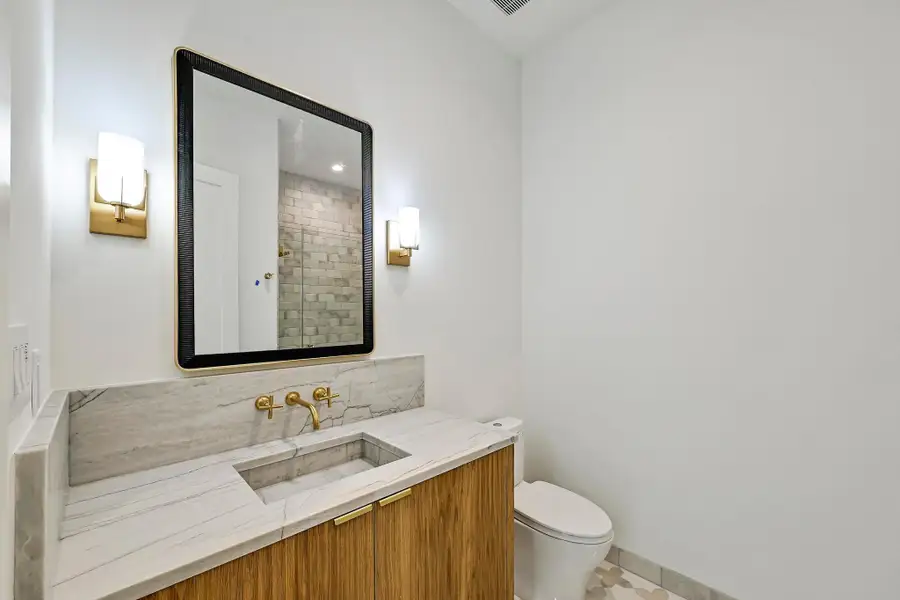 Powder room with full shower. Powder room with full shower.