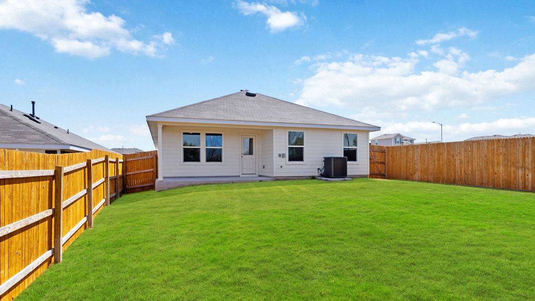 Exterior details and patio area of a home in Wayside, Uhland (Image 25).