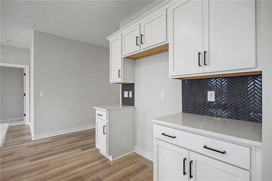 Furnished interior view inside a new home in The Park at Brighton, Locust Grove (Image 5).
