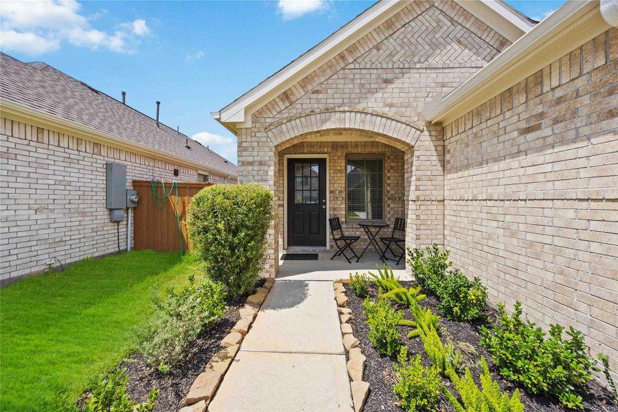 Front exterior of a new home in Marvida, Cypress, TX, highlighting curb appeal (Image 2). Front exterior of a new home in Marvida, Cypress, TX, highlighting curb appeal (Image 2).