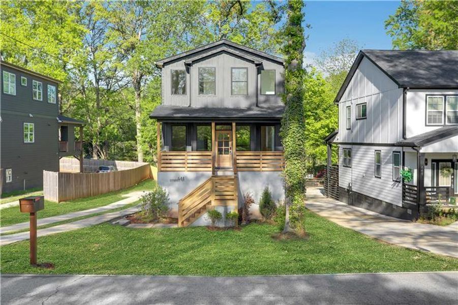 Front exterior of a new home in , Scottdale, GA, highlighting curb appeal (Image 28).