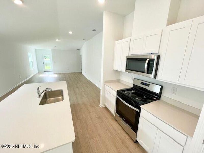 Furnished interior view inside a new home in Grand Reserve, Bunnell (Image 18).