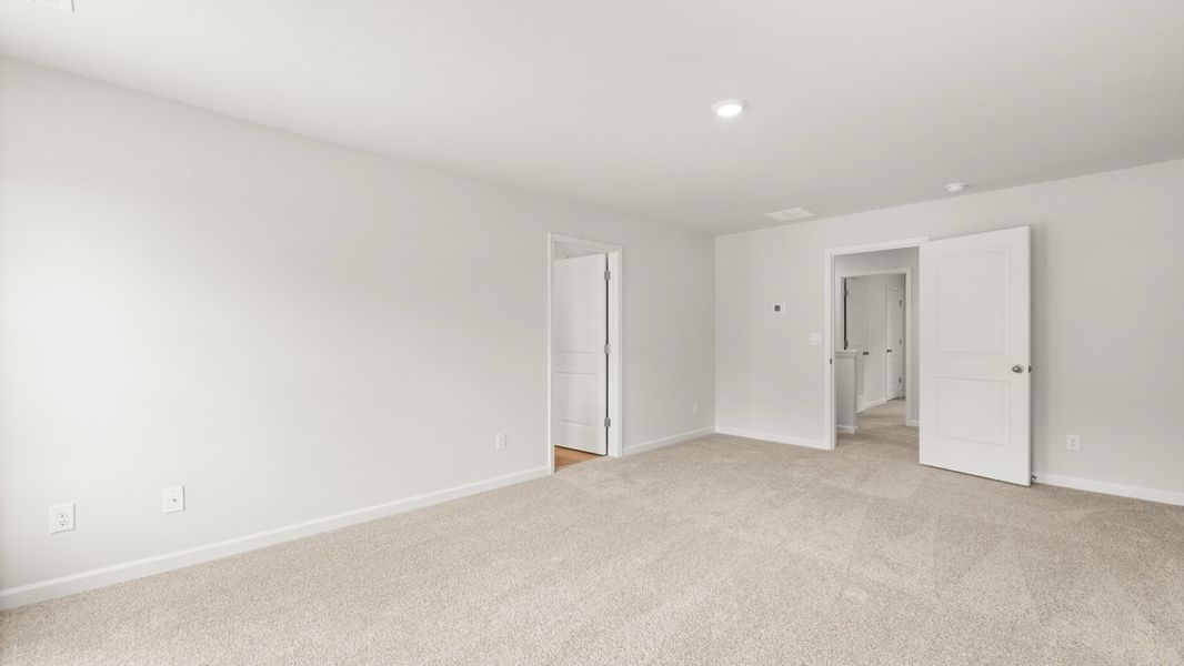 Representative unfurnished interior of a home built from the Hayden by D.R. Horton in Northwoods at Mirror Lake, Villa Rica (Image 32).
