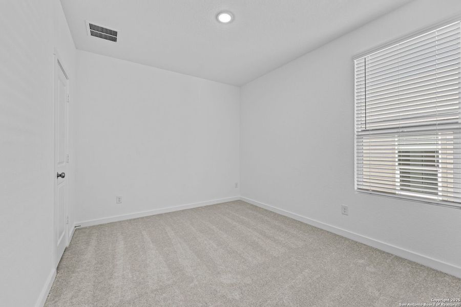 Spacious, unfurnished interior of a new home in Waterwheel: Coastline Collection, San Antonio (Image 19).