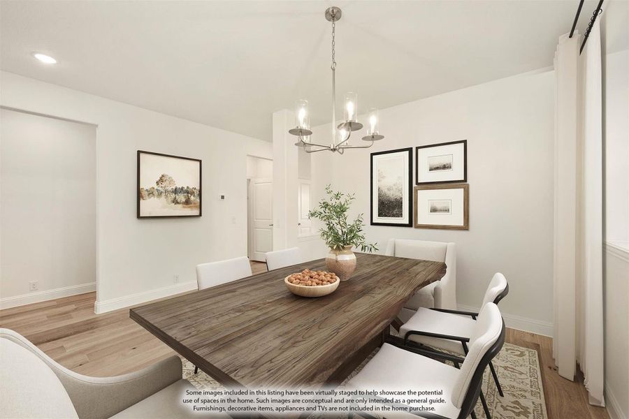 Dining room with wood table, white chairs, chandelier, and hardwood floors Dining room with wood table, white chairs, chandelier, and hardwood floors