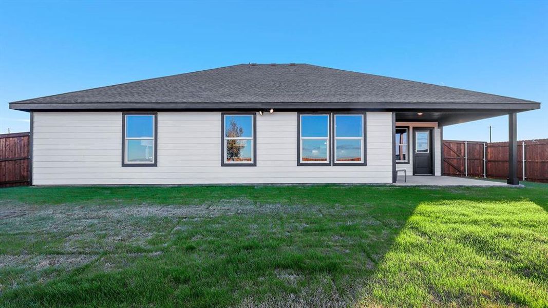 Front exterior of a new home in Retta Estates, Mansfield, TX, highlighting curb appeal (Image 2).