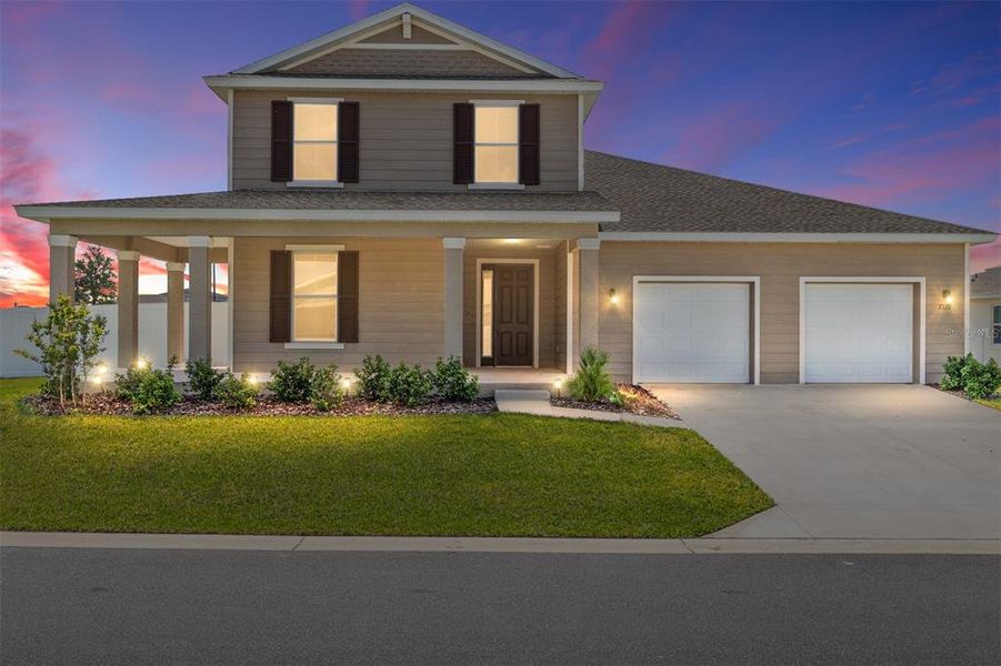 Front exterior of a new home in Calesa Township, Ocala, FL, highlighting curb appeal (Image 27). Front exterior of a new home in Calesa Township, Ocala, FL, highlighting curb appeal (Image 27).