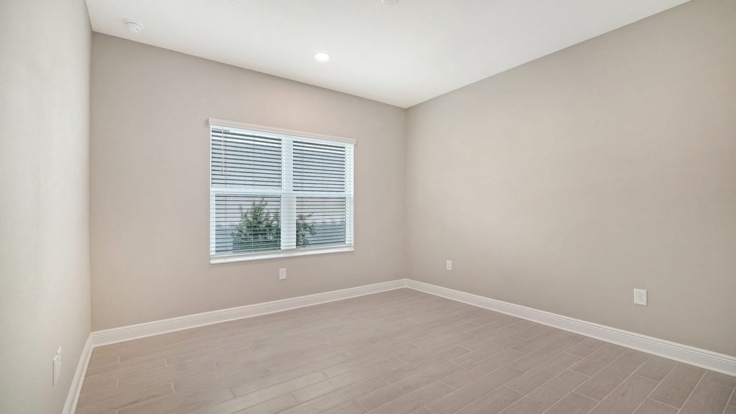 Spacious, unfurnished interior of a new home in Windward Real Estate and Homes for Sale in Sarasota, FL - Neal Communities, Lakewood Ranch (Image 32).