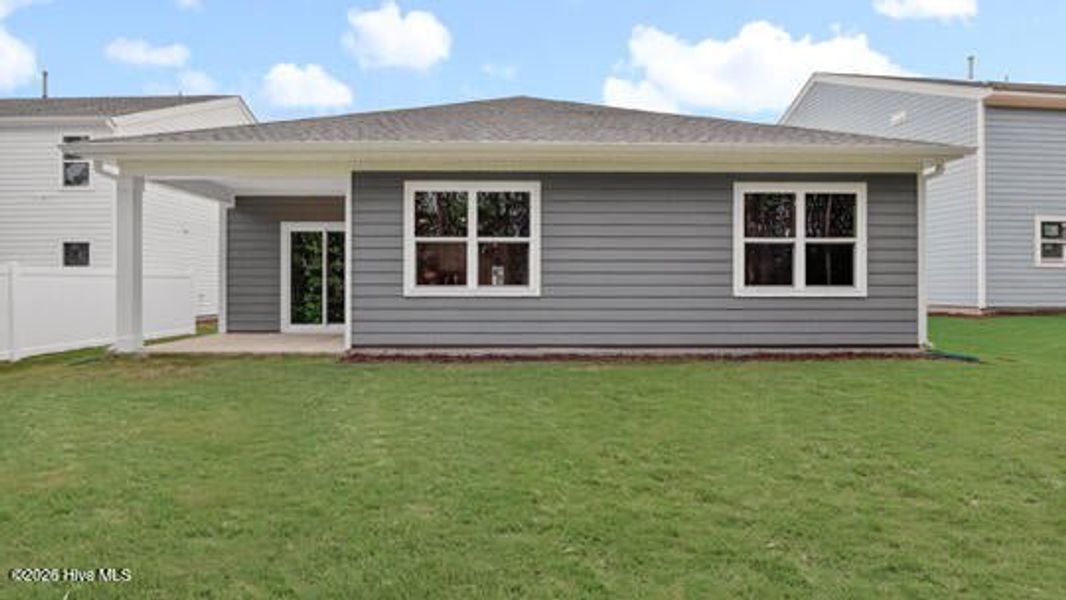 Exterior details and patio area of a home in Tyler - Home on the Lake, New Bern (Image 3).
