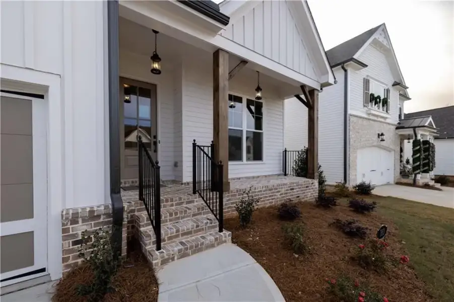Exterior details and patio area of a home in Aberdeen, Hoschton (Image 28).