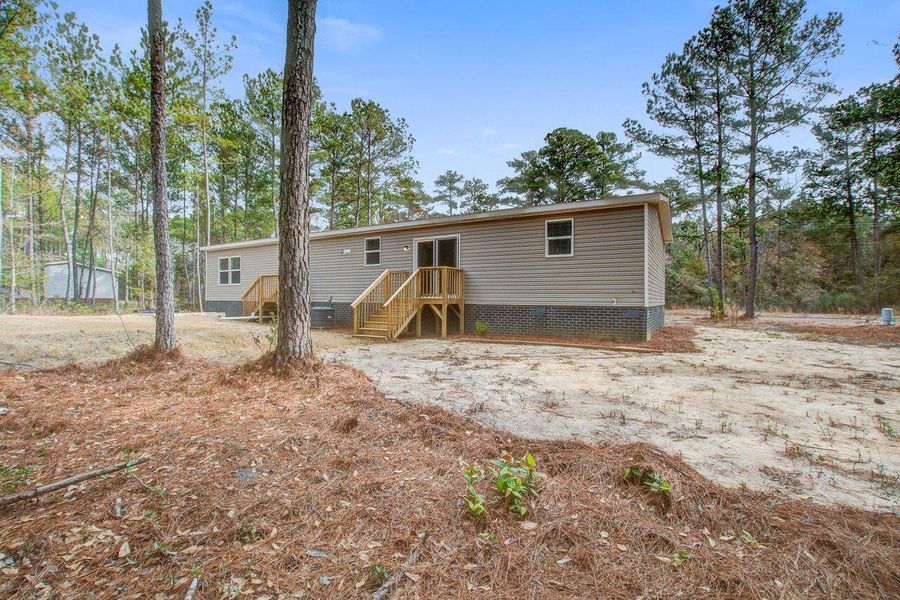 Exterior details and patio area of a home in , Walterboro (Image 16).