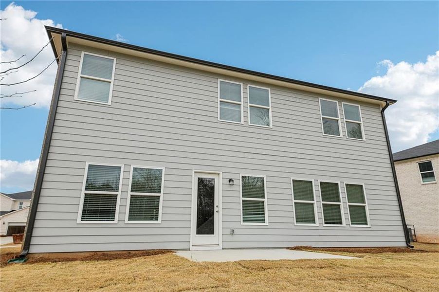 Exterior details and patio area of a home in Creekside at Oxford Park, Fairburn (Image 28). Exterior details and patio area of a home in Creekside at Oxford Park, Fairburn (Image 28).