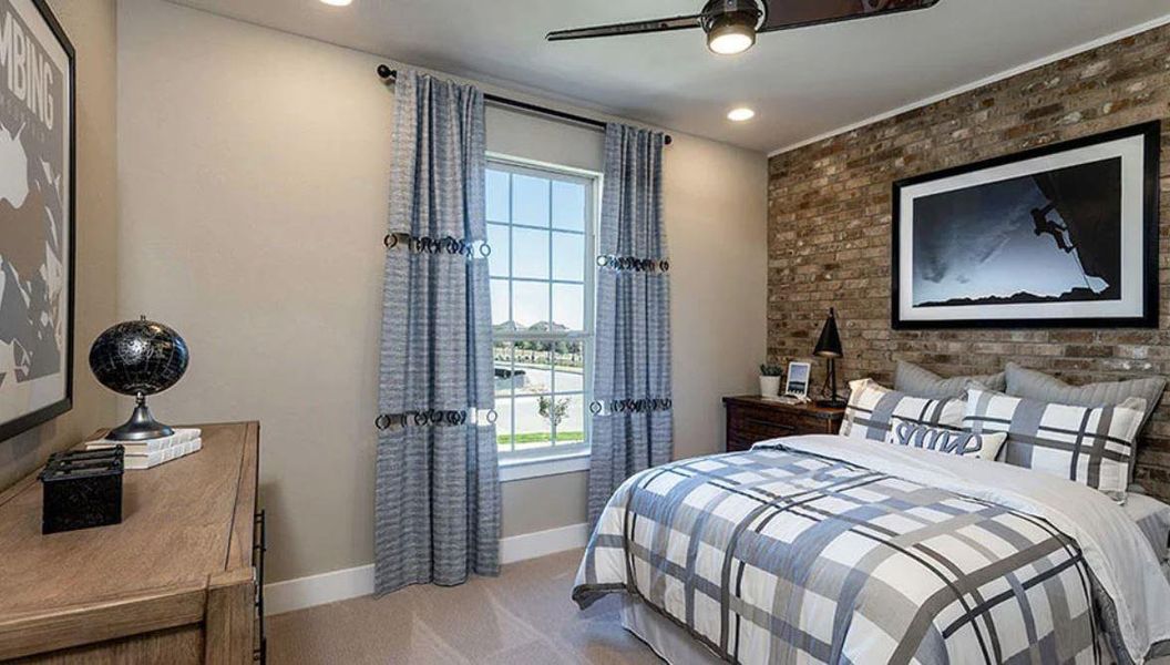 Bedroom with baseboards, recessed lighting, light colored carpet, and multiple windows Bedroom with baseboards, recessed lighting, light colored carpet, and multiple windows
