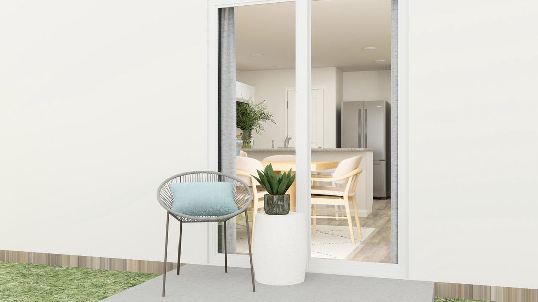 A room with a table chairs and a plant in it.