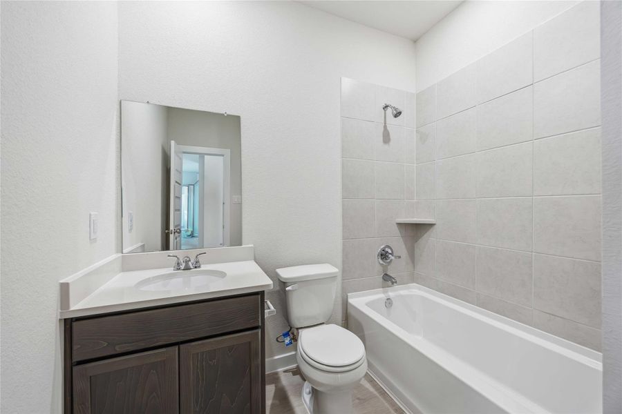 Furnished interior view inside a new home in Tejas Village, Beasley (Image 10).