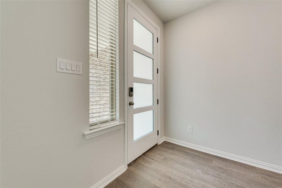 Entryway featuring light hardwood / wood-style flooring