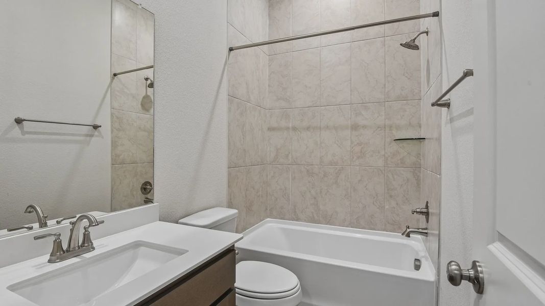 Furnished interior view inside a new home in Stream Waters, Seguin (Image 5).