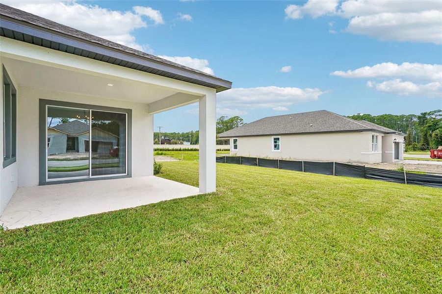 Exterior details and patio area of a home in Legends Preserve - Signature Series, Daytona Beach (Image 26).