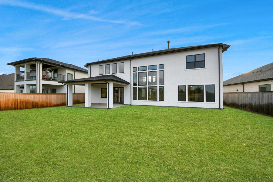 Large back yard ready for your personalized touches