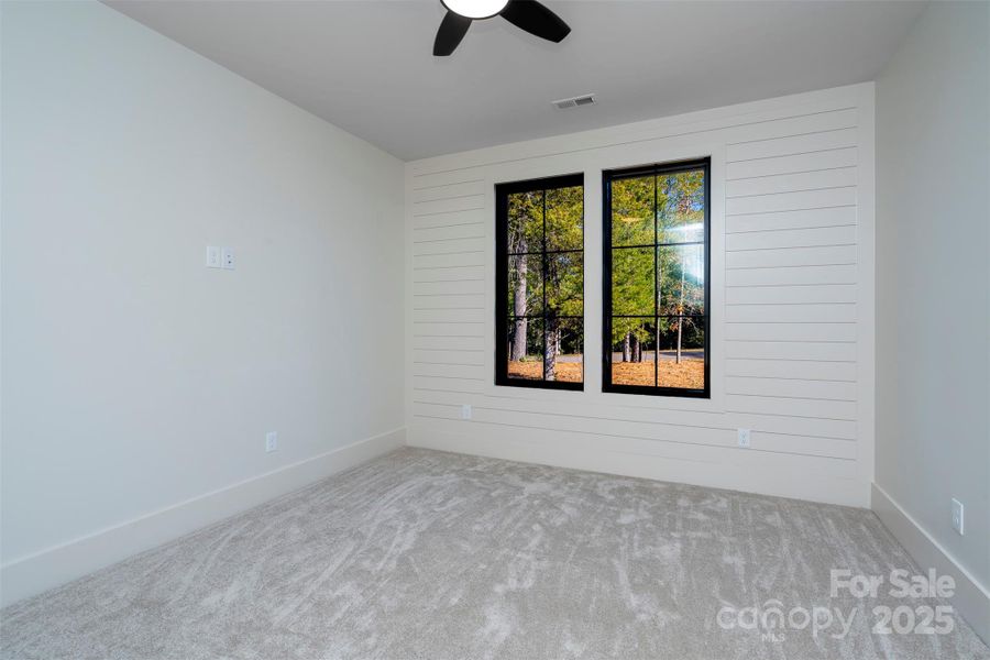 Third Bedroom with shiplap wall Third Bedroom with shiplap wall
