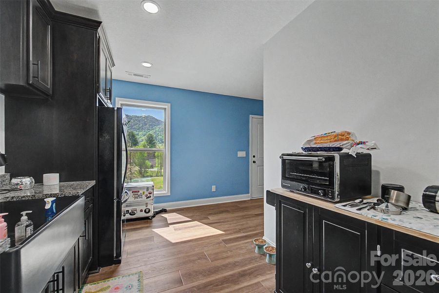 Furnished interior view inside a new home in , Waynesville (Image 18).