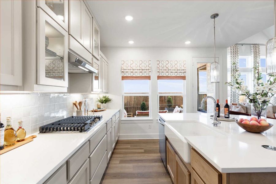Representative furnished interior of a home built from the Monet-SS by Highland Homes in Lariat, Liberty Hill (Image 12).
