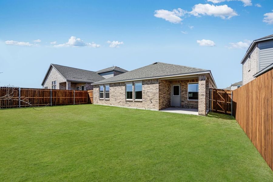 Exterior details and patio area of a home in Parks at Foster Crossing, Anna (Image 4).