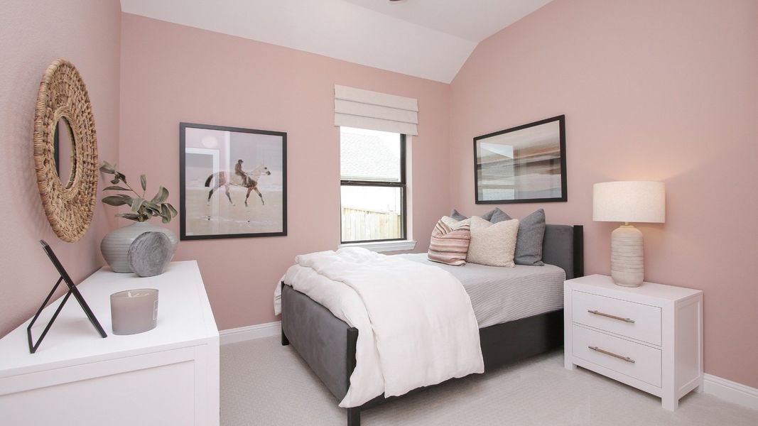 Representative furnished interior of a home built from the Willow by Brightland Homes in Sunterra, Katy (Image 18).