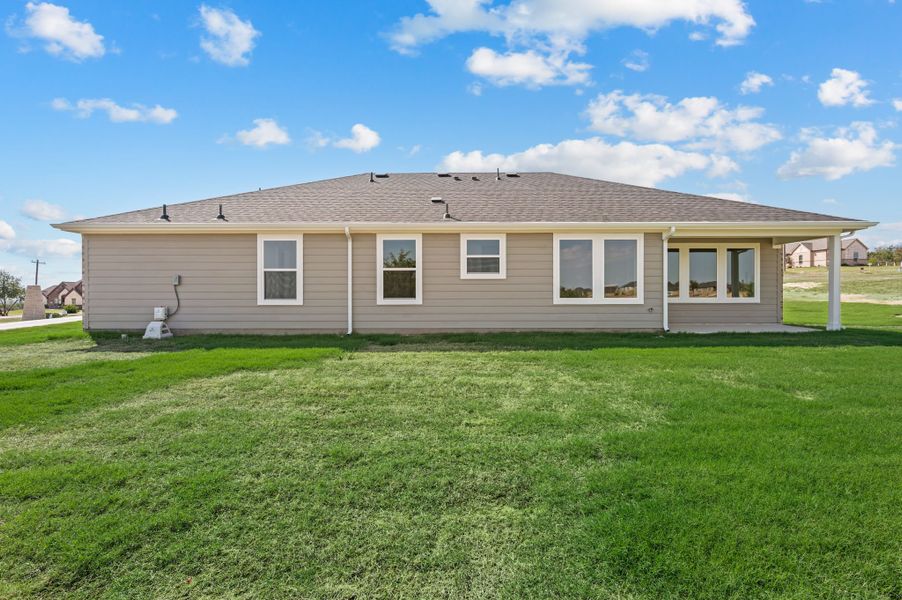 Exterior details and patio area of a home in Gatlin Ranch, Springtown (Image 22).