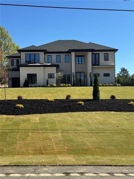 Front exterior of a new home in , Buford, GA, highlighting curb appeal (Image 18).