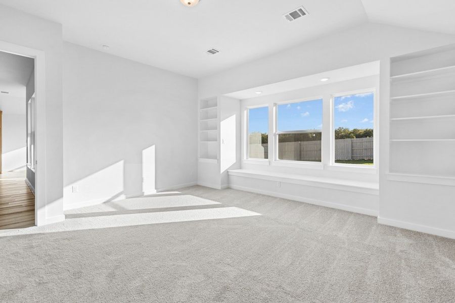 Spacious, unfurnished interior of a new home in The Colony, Bastrop (Image 23).