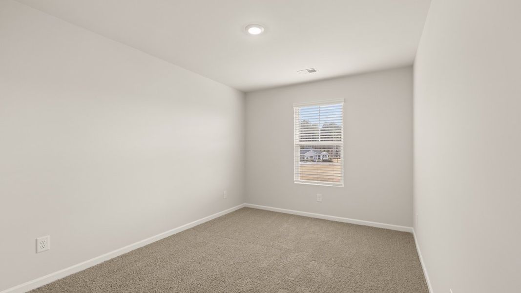 Representative unfurnished interior of a home built from the ANSLEY Express by D.R. Horton in WillowBrook, Winder (Image 26).