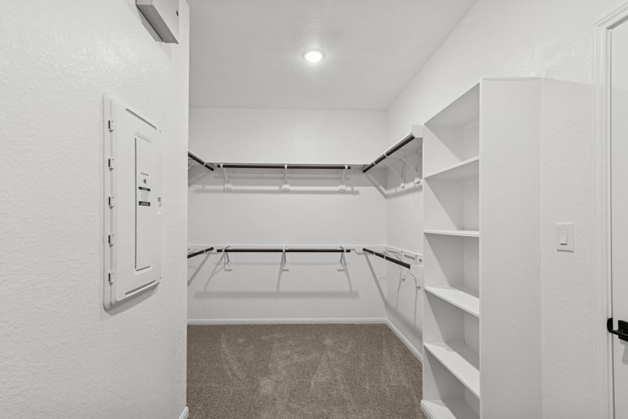 Primary walk-in closet (*Photo not of actual home and used for illustration purposes only.) Primary walk-in closet (*Photo not of actual home and used for illustration purposes only.)