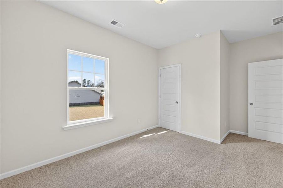 Spacious, unfurnished interior of a new home in Garrett Preserve, Douglasville (Image 31).