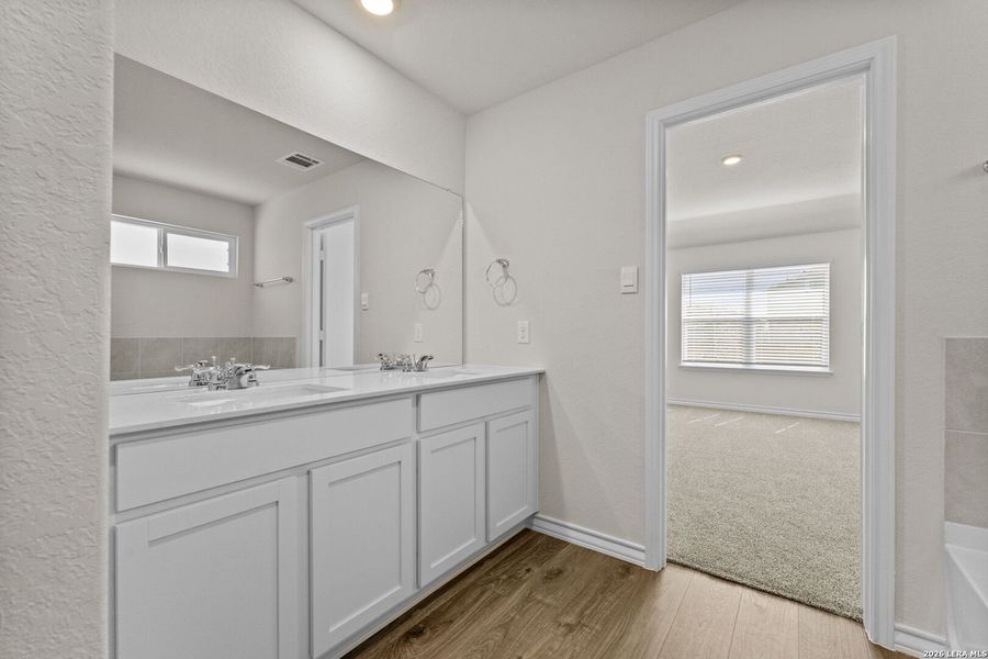 Furnished interior view inside a new home in Redbird Ranch, San Antonio (Image 6).