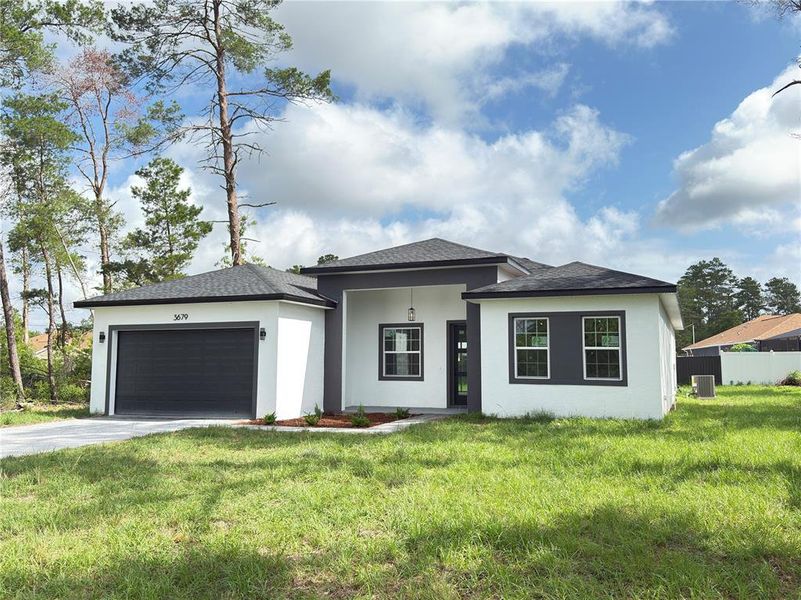 Front exterior of a new home in , Ocala, FL, highlighting curb appeal (Image 26).