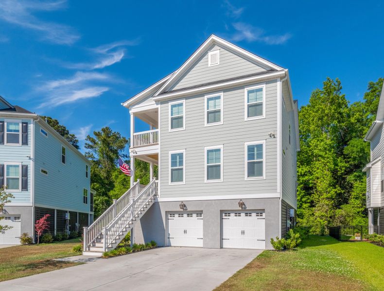 Front exterior of a new home in , Wando, SC, highlighting curb appeal (Image 23).