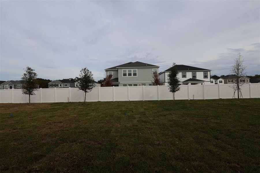 Exterior details and patio area of a home in Estates at Rivercrest, Sanford (Image 13). Exterior details and patio area of a home in Estates at Rivercrest, Sanford (Image 13).