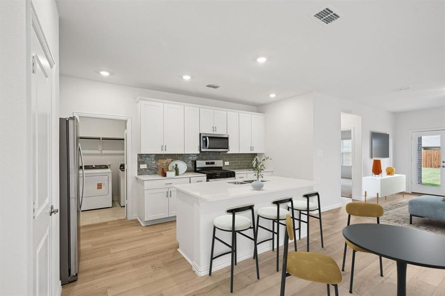 Photo is not of the actual home, but is an inspirational photo of builder’s model home and may depict options, furnishings, and/or decorator features that are not included.