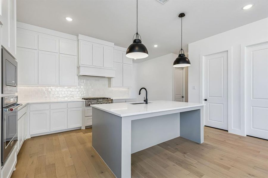 Beautiful cabinetry, gorgeous counter tops and designer backsplash paired with contemporary stainless steel come together to create the kitchen of your dreams!